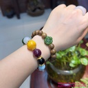 Vòng Trầm Kiến Việt mix charm hoa sen ngọc bích Canada thiên nhiên